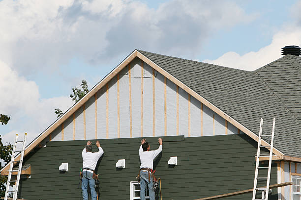 Professional Vinyl Siding technician working in Brookville, OH